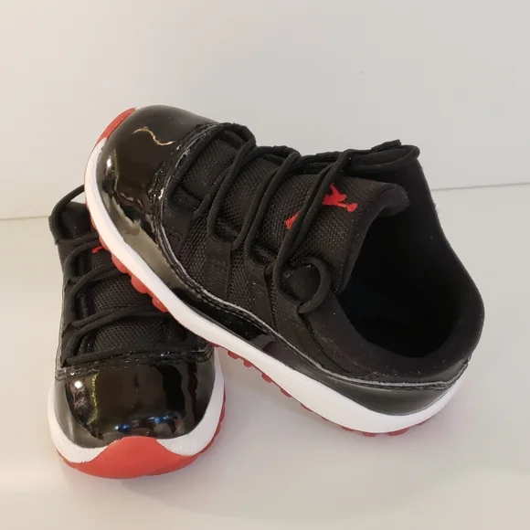 Jordan 11 Retro Low Kids Black and Red Sneakers - Picture 4 of 7